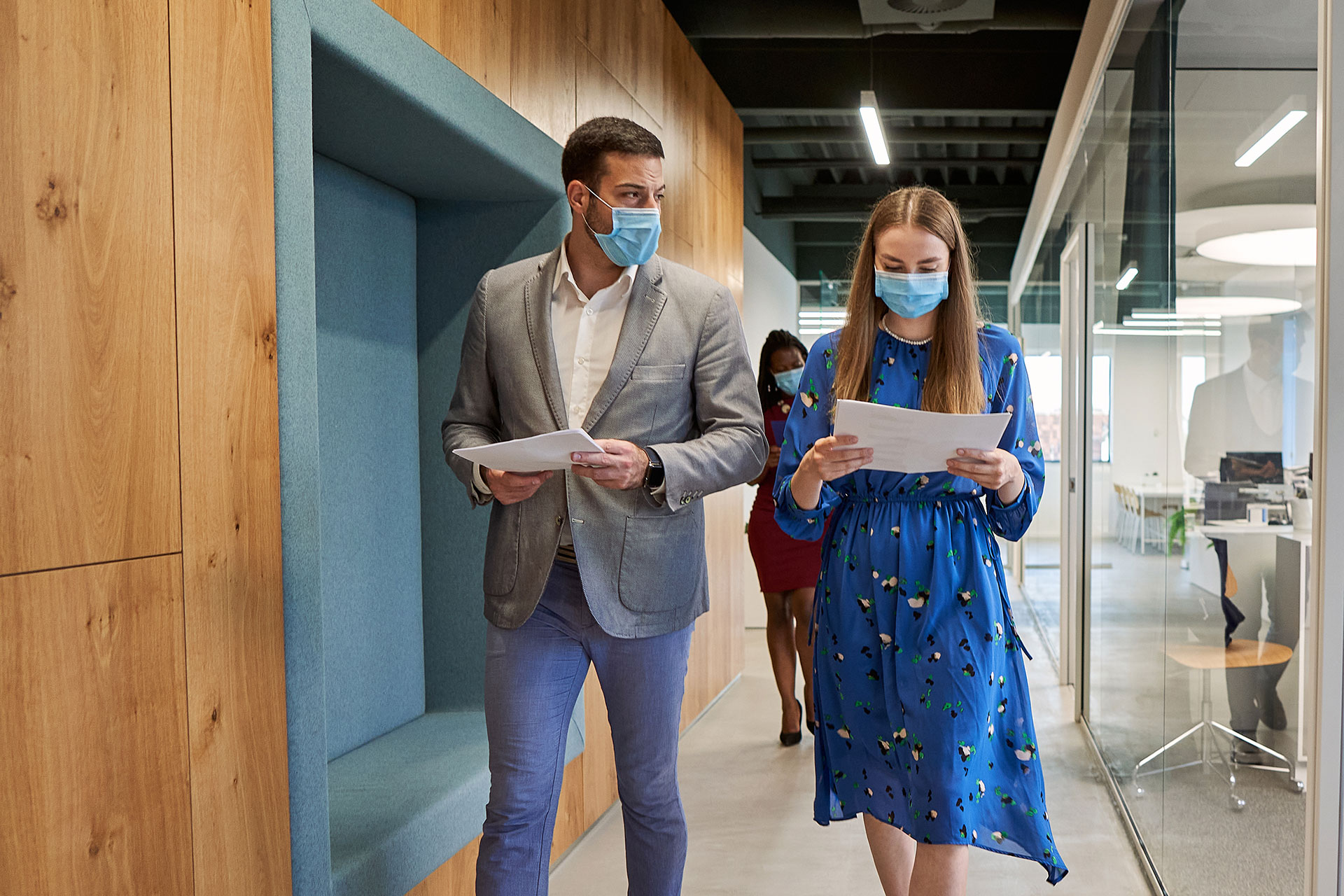 Colleagues walking down the hall in conservation