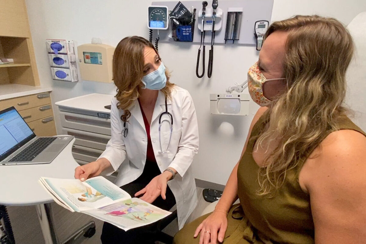 Doctor speaking to patient