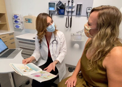 Doctor speaking to patient