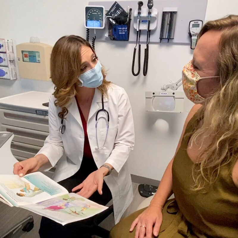 Doctor speaking to patient