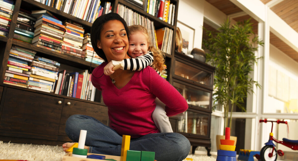 A mom and child demonstrate housing affordability to improve health