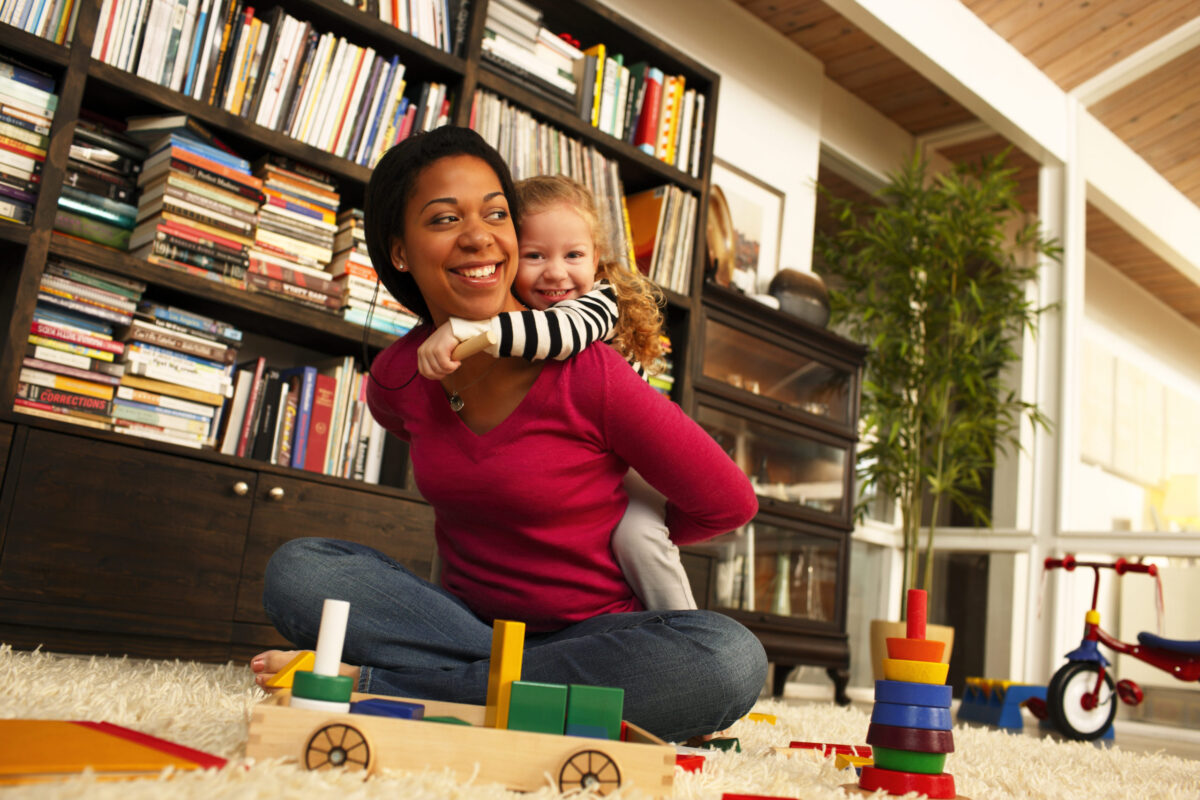A mom and child demonstrate housing affordability to improve health