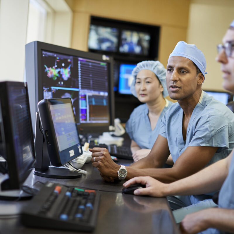 Electrophysiology doctors viewing scans