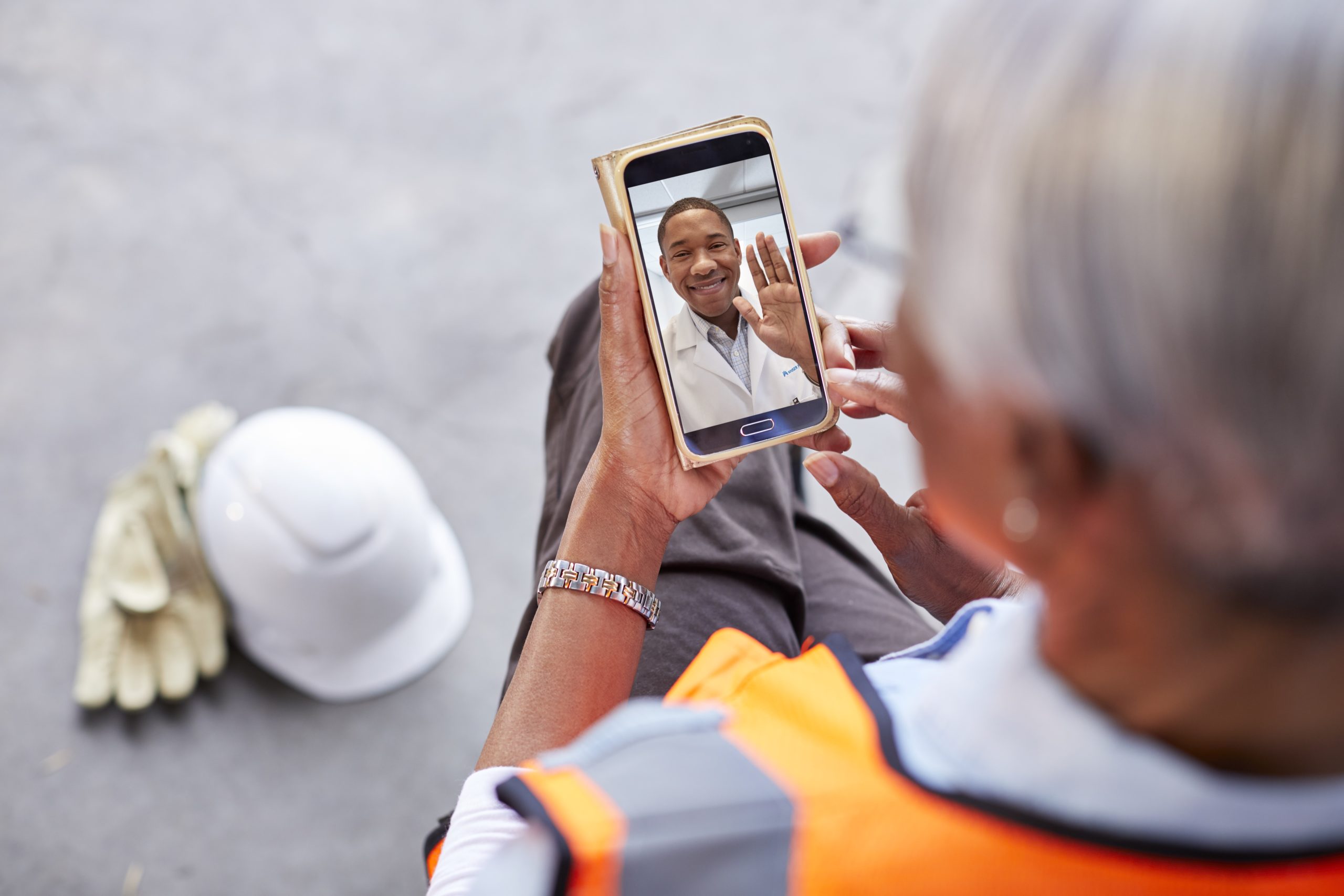 Woman on teleheath call with physician