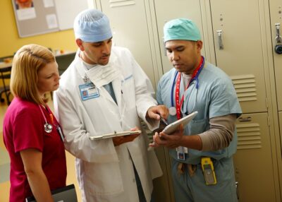 Surgical staff conferring