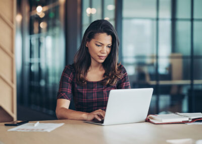 Businesswoman using laptop