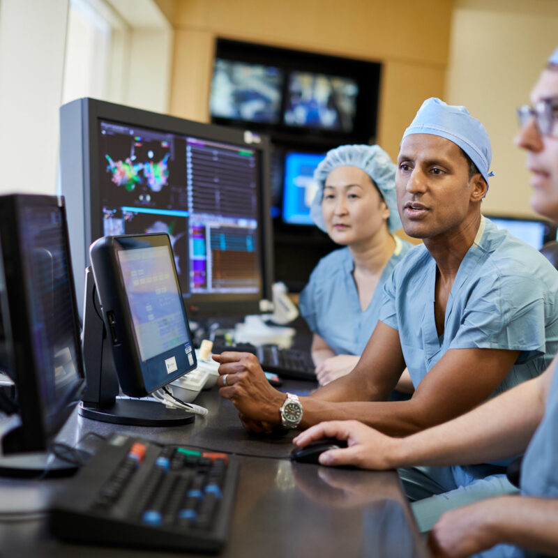 Electrophysiology doctors viewing scans