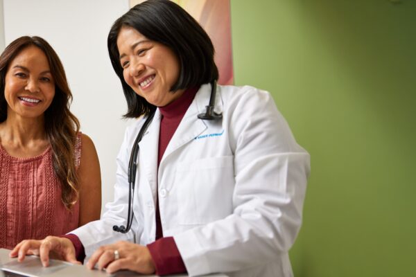 Patient getting checkup from KP Doctor